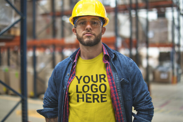 Worker wearing a safety green hi-vis t-shirt printed with a custom logo